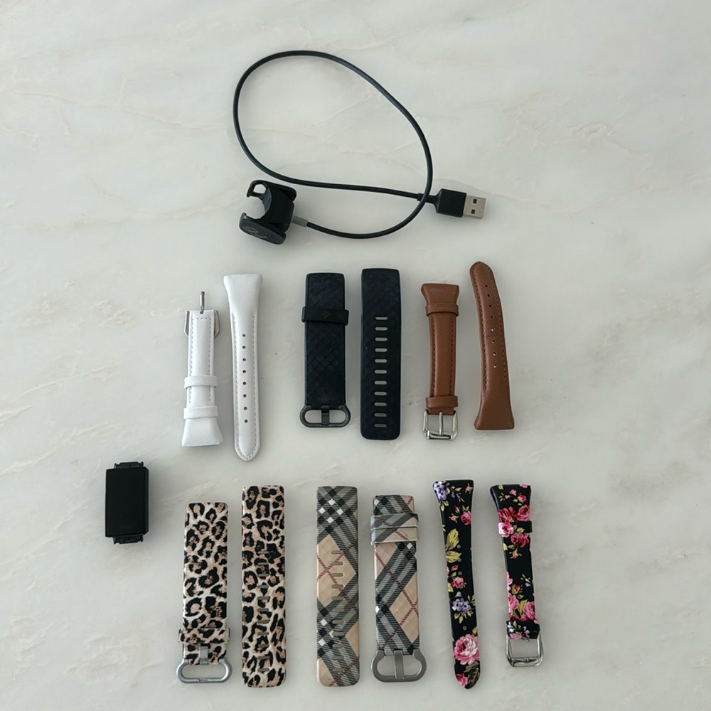 Fitbit charge 4 with six bands and charger, EC